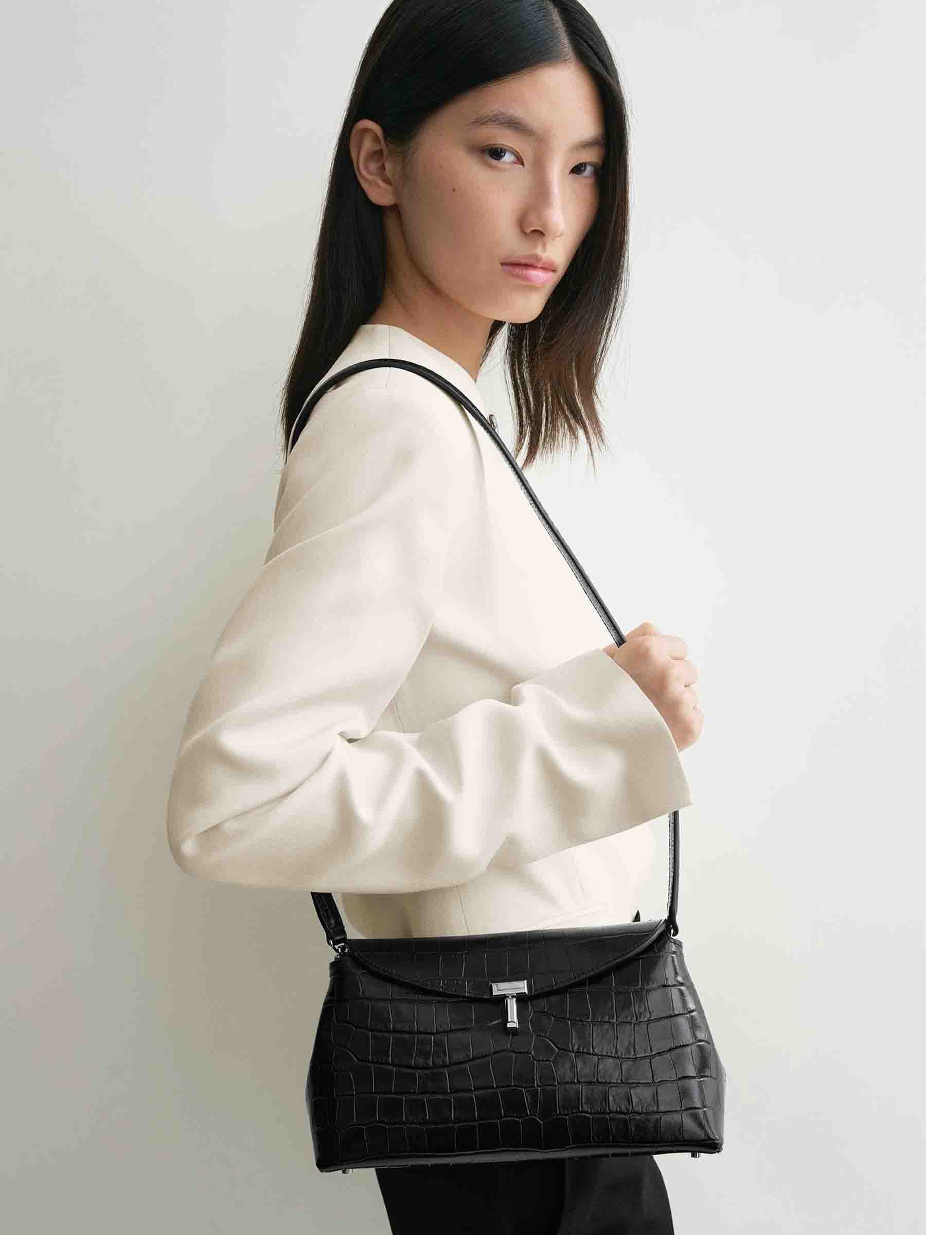 【TOTEME】T-Lock clutch bag T-Lock leather clutch ash – TOTEME