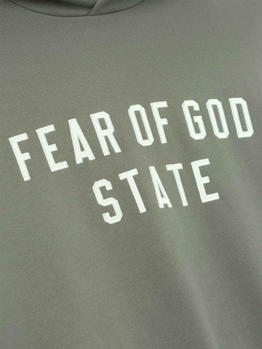 Fear of God Essentials Hombre Barcelona Sudadera con Capucha color Verde Militar sku 545-001927 01 - Foto 3