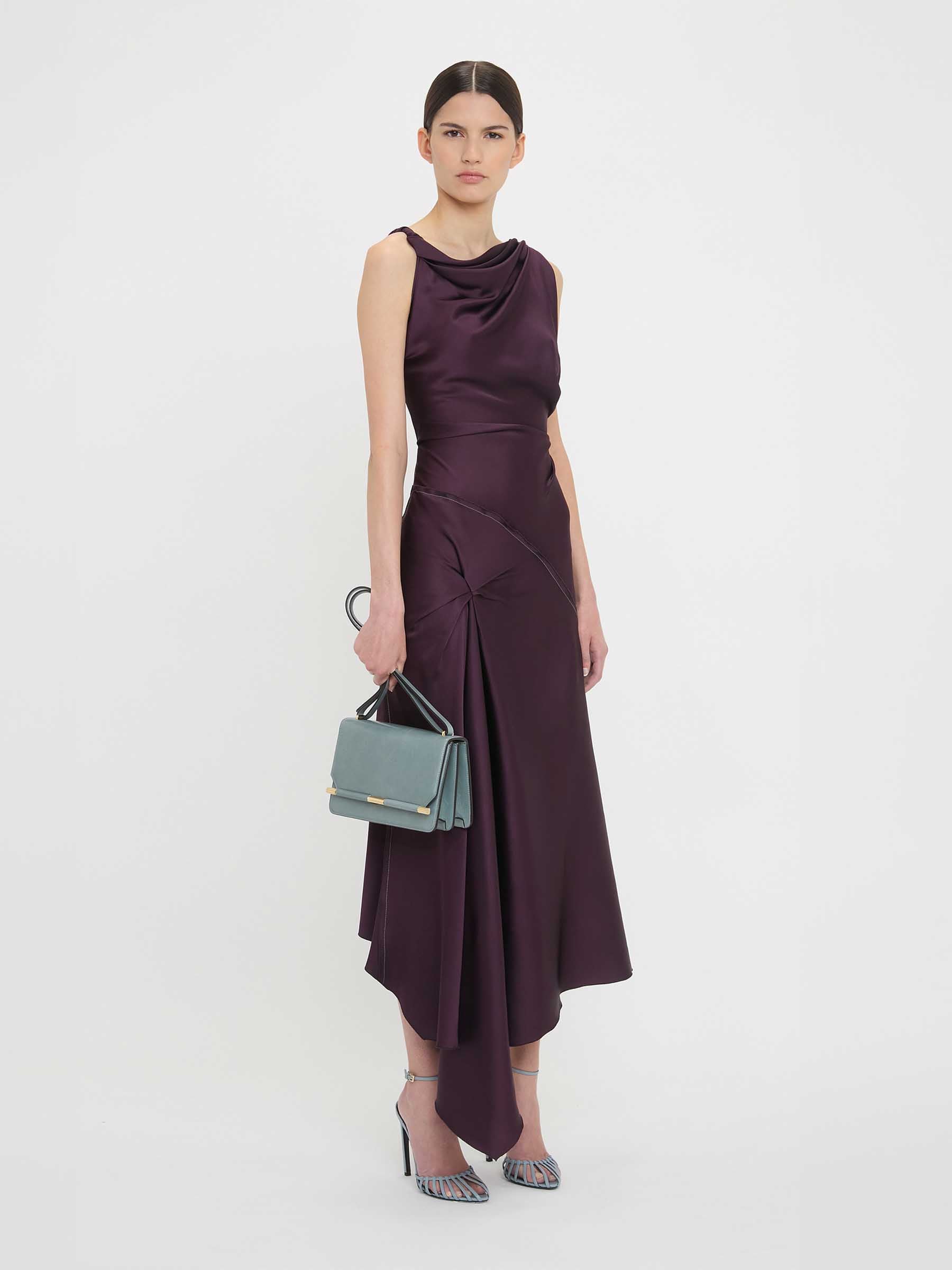 victoria beckham purple dress Long Sleeve Dolman V at the back with horizontal strap for a provocative point of interest and a godet insert and mini train for added fluidity VICTORIA BECKHAM Asymmetric stretch-jersey maxi