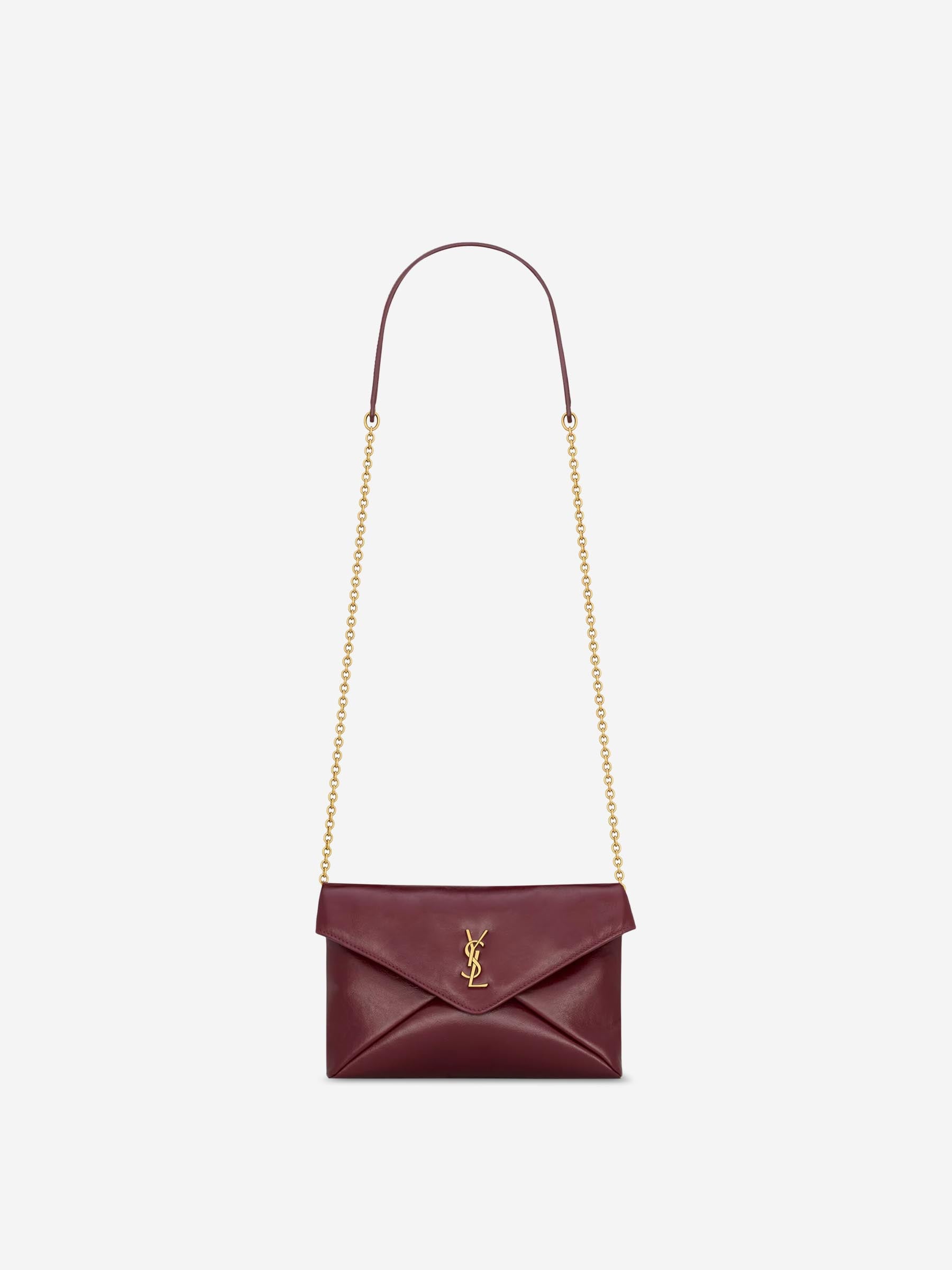 Saint Laurent Mujer Barcelona Bolso Pochette Cassandre color Burdeos sku 810-008386 01 - Foto 1