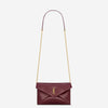 Saint Laurent Mujer Barcelona Bolso Pochette Cassandre color Burdeos sku 810-008386 01 - Foto 1